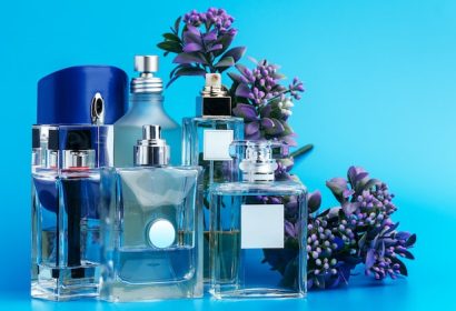 perfume-bottles-with-flowers-light-blue_127657-21456